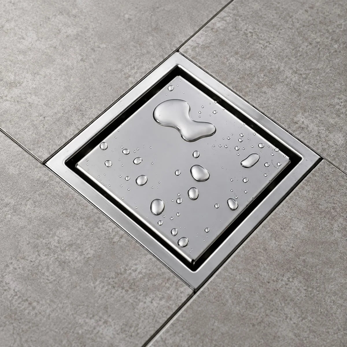 Desagüe al piso invisible TAUMM de 10 x 10 cm en acero inoxidable