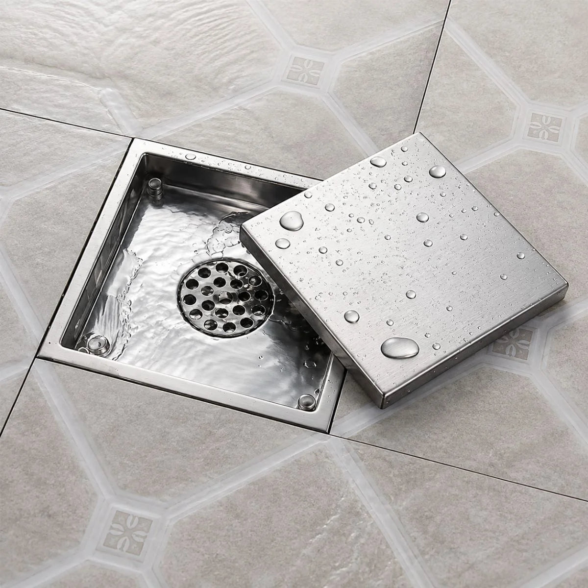 Desagüe al piso invisible TAUMM de 10 x 10 cm en acero inoxidable
