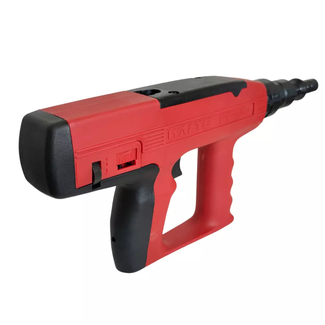 Pistola de impacto para clavos PT-950 a pólvora, calibre 27, con silenciador para fijación en hormigón y acero en construcción profesional.